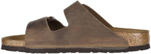 Arizona Narrow Unisex Shoes <div class="a-expander-content a-expander-partial-collapse-content" data-expanded="false"> <h3 class="product-facts-title">Product details</h3> <div class="a-fixed-left-grid product-facts-detail"> <div class="a-fixed-left-grid-inner" style="padding-left: 140px;"> <div class="a-fixed-left-grid-col a-col-left" style="width: 140px; margin-left: -140px; float: left;"><span style="font-weight: 600;"> <span class="a-color-base">Fabric type</span> </span></div> <div class="a-fixed-left-grid-col a-col-right" style="padding-left: 6%; float: left;"><span style="font-weight: 400;"> <span class="a-color-base">Fabric-and-synthetic</span> </span></div> </div> </div> <div class="a-fixed-left-grid product-facts-detail"> <div class="a-fixed-left-grid-inner" style="padding-left: 140px;"> <div class="a-fixed-left-grid-col a-col-left" style="width: 140px; margin-left: -140px; float: left;"><span style="font-weight: 600;"> <span class="a-color-base">Care instructions</span> </span></div> <div class="a-fixed-left-grid-col a-col-right" style="padding-left: 6%; float: left;"><span style="font-weight: 400;"> <span class="a-color-base">Hand Wash Only</span> </span></div> </div> </div> <div class="a-fixed-left-grid product-facts-detail"> <div class="a-fixed-left-grid-inner" style="padding-left: 140px;"> <div class="a-fixed-left-grid-col a-col-left" style="width: 140px; margin-left: -140px; float: left;"><span style="font-weight: 600;"> <span class="a-color-base">Origin</span> </span></div> <div class="a-fixed-left-grid-col a-col-right" style="padding-left: 6%; float: left;"><span style="font-weight: 400;"> <span class="a-color-base">Made in Germany</span> </span></div> </div> </div> <div class="a-fixed-left-grid product-facts-detail"> <div class="a-fixed-left-grid-inner" style="padding-left: 140px;"> <div class="a-fixed-left-grid-col a-col-left" style="width: 140px; margin-left: -140px; float: left;"><span style="font-weight: 600;"> <span class="a-color-base">Sole material</span> </span></div> <div class="a-fixed-left-grid-col a-col-right" style="padding-left: 6%; float: left;"><span style="font-weight: 400;"> <span class="a-color-base">Synthetic</span> </span></div> </div> </div> <hr class="a-spacing-base a-spacing-top-base a-divider-normal" aria-hidden="true" /> <h3 class="product-facts-title">About this item</h3> <ul class="a-unordered-list a-vertical a-spacing-small"> <li><span class="a-list-item a-size-base a-color-base">Narrow Width (, S, XN, Schmal, Estrecho, Slim, étroit, stretta)</span></li> </ul> <ul class="a-unordered-list a-vertical a-spacing-small"> <li><span class="a-list-item a-size-base a-color-base">Manufacturer: Birkenstock Material: Birko Flor</span></li> </ul> <ul class="a-unordered-list a-vertical a-spacing-small"> <li><span class="a-list-item a-size-base a-color-base">Footbed: EVA Sole: EVA</span></li> </ul> <ul class="a-unordered-list a-vertical a-spacing-small"> <li><span class="a-list-item a-size-base a-color-base">Made in Germany and send directly from Germany</span></li> </ul> <ul class="a-unordered-list a-vertical a-spacing-small"> <li><span class="a-list-item a-size-base a-color-base">Sandals</span></li> </ul> </div>