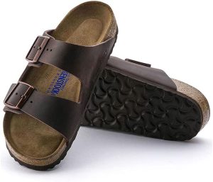 Men's Amalfi Leather Soft Footbed Arizona Sandals <div data-expanded="false" class="a-expander-content a-expander-partial-collapse-content"> <h3 class="product-facts-title"> Product details </h3> <div class="a-fixed-left-grid product-facts-detail"><div class="a-fixed-left-grid-inner" style="padding-left:140px"> <div class="a-fixed-left-grid-col a-col-left" style="width:140px;margin-left:-140px;float:left"> <span style="font-weight: 600"> <span class="a-color-base">Origin</span> </span> </div> <div class="a-fixed-left-grid-col a-col-right" style="padding-left:6%;float:left"> <span style="font-weight: 400"> <span class="a-color-base">Not Imported</span> </span> </div> </div></div> <div class="a-fixed-left-grid product-facts-detail"><div class="a-fixed-left-grid-inner" style="padding-left:140px"> <div class="a-fixed-left-grid-col a-col-left" style="width:140px;margin-left:-140px;float:left"> <span style="font-weight: 600"> <span class="a-color-base">Sole material</span> </span> </div> <div class="a-fixed-left-grid-col a-col-right" style="padding-left:6%;float:left"> <span style="font-weight: 400"> <span class="a-color-base">Foam, Cork, Suede, Rubber</span> </span> </div> </div></div> <div class="a-fixed-left-grid product-facts-detail"><div class="a-fixed-left-grid-inner" style="padding-left:140px"> <div class="a-fixed-left-grid-col a-col-left" style="width:140px;margin-left:-140px;float:left"> <span style="font-weight: 600"> <span class="a-color-base">Outer material</span> </span> </div> <div class="a-fixed-left-grid-col a-col-right" style="padding-left:6%;float:left"> <span style="font-weight: 400"> <span class="a-color-base">Suede</span> </span> </div> </div></div> <div class="a-fixed-left-grid product-facts-detail"><div class="a-fixed-left-grid-inner" style="padding-left:140px"> <div class="a-fixed-left-grid-col a-col-left" style="width:140px;margin-left:-140px;float:left"> <span style="font-weight: 600"> <span class="a-color-base">Closure type</span> </span> </div> <div class="a-fixed-left-grid-col a-col-right" style="padding-left:6%;float:left"> <span style="font-weight: 400"> <span class="a-color-base">Buckle</span> </span> </div> </div></div> <hr aria-hidden="true" class="a-spacing-base a-spacing-top-base a-divider-normal"> <h3 class="product-facts-title"> About this item </h3> <ul class="a-unordered-list a-vertical a-spacing-small"> <li><span class="a-list-item a-size-base a-color-base">Rubber sole</span></li> </ul> <ul class="a-unordered-list a-vertical a-spacing-small"> <li><span class="a-list-item a-size-base a-color-base">roomy toe box; lined with sued</span></li> </ul> <ul class="a-unordered-list a-vertical a-spacing-small"> <li><span class="a-list-item a-size-base a-color-base">features pronounced arch support with an extra layer of super soft foam cushioning</span></li> </ul> <ul class="a-unordered-list a-vertical a-spacing-small"> <li><span class="a-list-item a-size-base a-color-base">Contoured cork footbed conforms to the shape of your foot</span></li> </ul> </div>