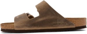 Men's Amalfi Leather Soft Footbed Arizona Sandals <div data-expanded="false" class="a-expander-content a-expander-partial-collapse-content"> <h3 class="product-facts-title"> Product details </h3> <div class="a-fixed-left-grid product-facts-detail"><div class="a-fixed-left-grid-inner" style="padding-left:140px"> <div class="a-fixed-left-grid-col a-col-left" style="width:140px;margin-left:-140px;float:left"> <span style="font-weight: 600"> <span class="a-color-base">Origin</span> </span> </div> <div class="a-fixed-left-grid-col a-col-right" style="padding-left:6%;float:left"> <span style="font-weight: 400"> <span class="a-color-base">Not Imported</span> </span> </div> </div></div> <div class="a-fixed-left-grid product-facts-detail"><div class="a-fixed-left-grid-inner" style="padding-left:140px"> <div class="a-fixed-left-grid-col a-col-left" style="width:140px;margin-left:-140px;float:left"> <span style="font-weight: 600"> <span class="a-color-base">Sole material</span> </span> </div> <div class="a-fixed-left-grid-col a-col-right" style="padding-left:6%;float:left"> <span style="font-weight: 400"> <span class="a-color-base">Foam, Cork, Suede, Rubber</span> </span> </div> </div></div> <div class="a-fixed-left-grid product-facts-detail"><div class="a-fixed-left-grid-inner" style="padding-left:140px"> <div class="a-fixed-left-grid-col a-col-left" style="width:140px;margin-left:-140px;float:left"> <span style="font-weight: 600"> <span class="a-color-base">Outer material</span> </span> </div> <div class="a-fixed-left-grid-col a-col-right" style="padding-left:6%;float:left"> <span style="font-weight: 400"> <span class="a-color-base">Suede</span> </span> </div> </div></div> <div class="a-fixed-left-grid product-facts-detail"><div class="a-fixed-left-grid-inner" style="padding-left:140px"> <div class="a-fixed-left-grid-col a-col-left" style="width:140px;margin-left:-140px;float:left"> <span style="font-weight: 600"> <span class="a-color-base">Closure type</span> </span> </div> <div class="a-fixed-left-grid-col a-col-right" style="padding-left:6%;float:left"> <span style="font-weight: 400"> <span class="a-color-base">Buckle</span> </span> </div> </div></div> <hr aria-hidden="true" class="a-spacing-base a-spacing-top-base a-divider-normal"> <h3 class="product-facts-title"> About this item </h3> <ul class="a-unordered-list a-vertical a-spacing-small"> <li><span class="a-list-item a-size-base a-color-base">Rubber sole</span></li> </ul> <ul class="a-unordered-list a-vertical a-spacing-small"> <li><span class="a-list-item a-size-base a-color-base">roomy toe box; lined with sued</span></li> </ul> <ul class="a-unordered-list a-vertical a-spacing-small"> <li><span class="a-list-item a-size-base a-color-base">features pronounced arch support with an extra layer of super soft foam cushioning</span></li> </ul> <ul class="a-unordered-list a-vertical a-spacing-small"> <li><span class="a-list-item a-size-base a-color-base">Contoured cork footbed conforms to the shape of your foot</span></li> </ul> </div>