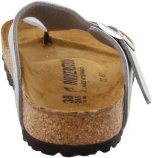 Arizona Narrow Unisex Shoes <div class="a-expander-content a-expander-partial-collapse-content" data-expanded="false"> <h3 class="product-facts-title">Product details</h3> <div class="a-fixed-left-grid product-facts-detail"> <div class="a-fixed-left-grid-inner" style="padding-left: 140px;"> <div class="a-fixed-left-grid-col a-col-left" style="width: 140px; margin-left: -140px; float: left;"><span style="font-weight: 600;"> <span class="a-color-base">Fabric type</span> </span></div> <div class="a-fixed-left-grid-col a-col-right" style="padding-left: 6%; float: left;"><span style="font-weight: 400;"> <span class="a-color-base">Fabric-and-synthetic</span> </span></div> </div> </div> <div class="a-fixed-left-grid product-facts-detail"> <div class="a-fixed-left-grid-inner" style="padding-left: 140px;"> <div class="a-fixed-left-grid-col a-col-left" style="width: 140px; margin-left: -140px; float: left;"><span style="font-weight: 600;"> <span class="a-color-base">Care instructions</span> </span></div> <div class="a-fixed-left-grid-col a-col-right" style="padding-left: 6%; float: left;"><span style="font-weight: 400;"> <span class="a-color-base">Hand Wash Only</span> </span></div> </div> </div> <div class="a-fixed-left-grid product-facts-detail"> <div class="a-fixed-left-grid-inner" style="padding-left: 140px;"> <div class="a-fixed-left-grid-col a-col-left" style="width: 140px; margin-left: -140px; float: left;"><span style="font-weight: 600;"> <span class="a-color-base">Origin</span> </span></div> <div class="a-fixed-left-grid-col a-col-right" style="padding-left: 6%; float: left;"><span style="font-weight: 400;"> <span class="a-color-base">Made in Germany</span> </span></div> </div> </div> <div class="a-fixed-left-grid product-facts-detail"> <div class="a-fixed-left-grid-inner" style="padding-left: 140px;"> <div class="a-fixed-left-grid-col a-col-left" style="width: 140px; margin-left: -140px; float: left;"><span style="font-weight: 600;"> <span class="a-color-base">Sole material</span> </span></div> <div class="a-fixed-left-grid-col a-col-right" style="padding-left: 6%; float: left;"><span style="font-weight: 400;"> <span class="a-color-base">Synthetic</span> </span></div> </div> </div> <hr class="a-spacing-base a-spacing-top-base a-divider-normal" aria-hidden="true" /> <h3 class="product-facts-title">About this item</h3> <ul class="a-unordered-list a-vertical a-spacing-small"> <li><span class="a-list-item a-size-base a-color-base">Narrow Width (, S, XN, Schmal, Estrecho, Slim, étroit, stretta)</span></li> </ul> <ul class="a-unordered-list a-vertical a-spacing-small"> <li><span class="a-list-item a-size-base a-color-base">Manufacturer: Birkenstock Material: Birko Flor</span></li> </ul> <ul class="a-unordered-list a-vertical a-spacing-small"> <li><span class="a-list-item a-size-base a-color-base">Footbed: EVA Sole: EVA</span></li> </ul> <ul class="a-unordered-list a-vertical a-spacing-small"> <li><span class="a-list-item a-size-base a-color-base">Made in Germany and send directly from Germany</span></li> </ul> <ul class="a-unordered-list a-vertical a-spacing-small"> <li><span class="a-list-item a-size-base a-color-base">Sandals</span></li> </ul> </div>