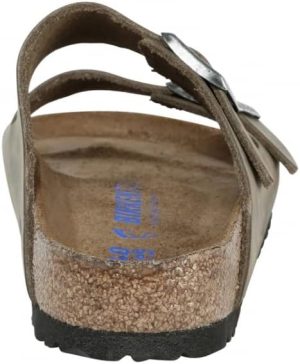 Arizona Narrow Unisex Shoes <div class="a-expander-content a-expander-partial-collapse-content" data-expanded="false"> <h3 class="product-facts-title">Product details</h3> <div class="a-fixed-left-grid product-facts-detail"> <div class="a-fixed-left-grid-inner" style="padding-left: 140px;"> <div class="a-fixed-left-grid-col a-col-left" style="width: 140px; margin-left: -140px; float: left;"><span style="font-weight: 600;"> <span class="a-color-base">Fabric type</span> </span></div> <div class="a-fixed-left-grid-col a-col-right" style="padding-left: 6%; float: left;"><span style="font-weight: 400;"> <span class="a-color-base">Fabric-and-synthetic</span> </span></div> </div> </div> <div class="a-fixed-left-grid product-facts-detail"> <div class="a-fixed-left-grid-inner" style="padding-left: 140px;"> <div class="a-fixed-left-grid-col a-col-left" style="width: 140px; margin-left: -140px; float: left;"><span style="font-weight: 600;"> <span class="a-color-base">Care instructions</span> </span></div> <div class="a-fixed-left-grid-col a-col-right" style="padding-left: 6%; float: left;"><span style="font-weight: 400;"> <span class="a-color-base">Hand Wash Only</span> </span></div> </div> </div> <div class="a-fixed-left-grid product-facts-detail"> <div class="a-fixed-left-grid-inner" style="padding-left: 140px;"> <div class="a-fixed-left-grid-col a-col-left" style="width: 140px; margin-left: -140px; float: left;"><span style="font-weight: 600;"> <span class="a-color-base">Origin</span> </span></div> <div class="a-fixed-left-grid-col a-col-right" style="padding-left: 6%; float: left;"><span style="font-weight: 400;"> <span class="a-color-base">Made in Germany</span> </span></div> </div> </div> <div class="a-fixed-left-grid product-facts-detail"> <div class="a-fixed-left-grid-inner" style="padding-left: 140px;"> <div class="a-fixed-left-grid-col a-col-left" style="width: 140px; margin-left: -140px; float: left;"><span style="font-weight: 600;"> <span class="a-color-base">Sole material</span> </span></div> <div class="a-fixed-left-grid-col a-col-right" style="padding-left: 6%; float: left;"><span style="font-weight: 400;"> <span class="a-color-base">Synthetic</span> </span></div> </div> </div> <hr class="a-spacing-base a-spacing-top-base a-divider-normal" aria-hidden="true" /> <h3 class="product-facts-title">About this item</h3> <ul class="a-unordered-list a-vertical a-spacing-small"> <li><span class="a-list-item a-size-base a-color-base">Narrow Width (, S, XN, Schmal, Estrecho, Slim, étroit, stretta)</span></li> </ul> <ul class="a-unordered-list a-vertical a-spacing-small"> <li><span class="a-list-item a-size-base a-color-base">Manufacturer: Birkenstock Material: Birko Flor</span></li> </ul> <ul class="a-unordered-list a-vertical a-spacing-small"> <li><span class="a-list-item a-size-base a-color-base">Footbed: EVA Sole: EVA</span></li> </ul> <ul class="a-unordered-list a-vertical a-spacing-small"> <li><span class="a-list-item a-size-base a-color-base">Made in Germany and send directly from Germany</span></li> </ul> <ul class="a-unordered-list a-vertical a-spacing-small"> <li><span class="a-list-item a-size-base a-color-base">Sandals</span></li> </ul> </div>