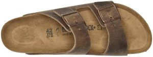 Arizona Narrow Unisex Shoes <div class="a-expander-content a-expander-partial-collapse-content" data-expanded="false"> <h3 class="product-facts-title">Product details</h3> <div class="a-fixed-left-grid product-facts-detail"> <div class="a-fixed-left-grid-inner" style="padding-left: 140px;"> <div class="a-fixed-left-grid-col a-col-left" style="width: 140px; margin-left: -140px; float: left;"><span style="font-weight: 600;"> <span class="a-color-base">Fabric type</span> </span></div> <div class="a-fixed-left-grid-col a-col-right" style="padding-left: 6%; float: left;"><span style="font-weight: 400;"> <span class="a-color-base">Fabric-and-synthetic</span> </span></div> </div> </div> <div class="a-fixed-left-grid product-facts-detail"> <div class="a-fixed-left-grid-inner" style="padding-left: 140px;"> <div class="a-fixed-left-grid-col a-col-left" style="width: 140px; margin-left: -140px; float: left;"><span style="font-weight: 600;"> <span class="a-color-base">Care instructions</span> </span></div> <div class="a-fixed-left-grid-col a-col-right" style="padding-left: 6%; float: left;"><span style="font-weight: 400;"> <span class="a-color-base">Hand Wash Only</span> </span></div> </div> </div> <div class="a-fixed-left-grid product-facts-detail"> <div class="a-fixed-left-grid-inner" style="padding-left: 140px;"> <div class="a-fixed-left-grid-col a-col-left" style="width: 140px; margin-left: -140px; float: left;"><span style="font-weight: 600;"> <span class="a-color-base">Origin</span> </span></div> <div class="a-fixed-left-grid-col a-col-right" style="padding-left: 6%; float: left;"><span style="font-weight: 400;"> <span class="a-color-base">Made in Germany</span> </span></div> </div> </div> <div class="a-fixed-left-grid product-facts-detail"> <div class="a-fixed-left-grid-inner" style="padding-left: 140px;"> <div class="a-fixed-left-grid-col a-col-left" style="width: 140px; margin-left: -140px; float: left;"><span style="font-weight: 600;"> <span class="a-color-base">Sole material</span> </span></div> <div class="a-fixed-left-grid-col a-col-right" style="padding-left: 6%; float: left;"><span style="font-weight: 400;"> <span class="a-color-base">Synthetic</span> </span></div> </div> </div> <hr class="a-spacing-base a-spacing-top-base a-divider-normal" aria-hidden="true" /> <h3 class="product-facts-title">About this item</h3> <ul class="a-unordered-list a-vertical a-spacing-small"> <li><span class="a-list-item a-size-base a-color-base">Narrow Width (, S, XN, Schmal, Estrecho, Slim, étroit, stretta)</span></li> </ul> <ul class="a-unordered-list a-vertical a-spacing-small"> <li><span class="a-list-item a-size-base a-color-base">Manufacturer: Birkenstock Material: Birko Flor</span></li> </ul> <ul class="a-unordered-list a-vertical a-spacing-small"> <li><span class="a-list-item a-size-base a-color-base">Footbed: EVA Sole: EVA</span></li> </ul> <ul class="a-unordered-list a-vertical a-spacing-small"> <li><span class="a-list-item a-size-base a-color-base">Made in Germany and send directly from Germany</span></li> </ul> <ul class="a-unordered-list a-vertical a-spacing-small"> <li><span class="a-list-item a-size-base a-color-base">Sandals</span></li> </ul> </div>