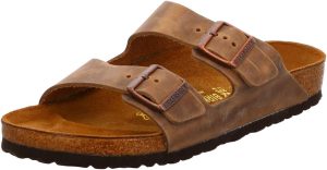 Men's Amalfi Leather Soft Footbed Arizona Sandals <div data-expanded="false" class="a-expander-content a-expander-partial-collapse-content"> <h3 class="product-facts-title"> Product details </h3> <div class="a-fixed-left-grid product-facts-detail"><div class="a-fixed-left-grid-inner" style="padding-left:140px"> <div class="a-fixed-left-grid-col a-col-left" style="width:140px;margin-left:-140px;float:left"> <span style="font-weight: 600"> <span class="a-color-base">Origin</span> </span> </div> <div class="a-fixed-left-grid-col a-col-right" style="padding-left:6%;float:left"> <span style="font-weight: 400"> <span class="a-color-base">Not Imported</span> </span> </div> </div></div> <div class="a-fixed-left-grid product-facts-detail"><div class="a-fixed-left-grid-inner" style="padding-left:140px"> <div class="a-fixed-left-grid-col a-col-left" style="width:140px;margin-left:-140px;float:left"> <span style="font-weight: 600"> <span class="a-color-base">Sole material</span> </span> </div> <div class="a-fixed-left-grid-col a-col-right" style="padding-left:6%;float:left"> <span style="font-weight: 400"> <span class="a-color-base">Foam, Cork, Suede, Rubber</span> </span> </div> </div></div> <div class="a-fixed-left-grid product-facts-detail"><div class="a-fixed-left-grid-inner" style="padding-left:140px"> <div class="a-fixed-left-grid-col a-col-left" style="width:140px;margin-left:-140px;float:left"> <span style="font-weight: 600"> <span class="a-color-base">Outer material</span> </span> </div> <div class="a-fixed-left-grid-col a-col-right" style="padding-left:6%;float:left"> <span style="font-weight: 400"> <span class="a-color-base">Suede</span> </span> </div> </div></div> <div class="a-fixed-left-grid product-facts-detail"><div class="a-fixed-left-grid-inner" style="padding-left:140px"> <div class="a-fixed-left-grid-col a-col-left" style="width:140px;margin-left:-140px;float:left"> <span style="font-weight: 600"> <span class="a-color-base">Closure type</span> </span> </div> <div class="a-fixed-left-grid-col a-col-right" style="padding-left:6%;float:left"> <span style="font-weight: 400"> <span class="a-color-base">Buckle</span> </span> </div> </div></div> <hr aria-hidden="true" class="a-spacing-base a-spacing-top-base a-divider-normal"> <h3 class="product-facts-title"> About this item </h3> <ul class="a-unordered-list a-vertical a-spacing-small"> <li><span class="a-list-item a-size-base a-color-base">Rubber sole</span></li> </ul> <ul class="a-unordered-list a-vertical a-spacing-small"> <li><span class="a-list-item a-size-base a-color-base">roomy toe box; lined with sued</span></li> </ul> <ul class="a-unordered-list a-vertical a-spacing-small"> <li><span class="a-list-item a-size-base a-color-base">features pronounced arch support with an extra layer of super soft foam cushioning</span></li> </ul> <ul class="a-unordered-list a-vertical a-spacing-small"> <li><span class="a-list-item a-size-base a-color-base">Contoured cork footbed conforms to the shape of your foot</span></li> </ul> </div>