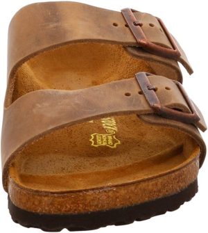 Men's Amalfi Leather Soft Footbed Arizona Sandals <div data-expanded="false" class="a-expander-content a-expander-partial-collapse-content"> <h3 class="product-facts-title"> Product details </h3> <div class="a-fixed-left-grid product-facts-detail"><div class="a-fixed-left-grid-inner" style="padding-left:140px"> <div class="a-fixed-left-grid-col a-col-left" style="width:140px;margin-left:-140px;float:left"> <span style="font-weight: 600"> <span class="a-color-base">Origin</span> </span> </div> <div class="a-fixed-left-grid-col a-col-right" style="padding-left:6%;float:left"> <span style="font-weight: 400"> <span class="a-color-base">Not Imported</span> </span> </div> </div></div> <div class="a-fixed-left-grid product-facts-detail"><div class="a-fixed-left-grid-inner" style="padding-left:140px"> <div class="a-fixed-left-grid-col a-col-left" style="width:140px;margin-left:-140px;float:left"> <span style="font-weight: 600"> <span class="a-color-base">Sole material</span> </span> </div> <div class="a-fixed-left-grid-col a-col-right" style="padding-left:6%;float:left"> <span style="font-weight: 400"> <span class="a-color-base">Foam, Cork, Suede, Rubber</span> </span> </div> </div></div> <div class="a-fixed-left-grid product-facts-detail"><div class="a-fixed-left-grid-inner" style="padding-left:140px"> <div class="a-fixed-left-grid-col a-col-left" style="width:140px;margin-left:-140px;float:left"> <span style="font-weight: 600"> <span class="a-color-base">Outer material</span> </span> </div> <div class="a-fixed-left-grid-col a-col-right" style="padding-left:6%;float:left"> <span style="font-weight: 400"> <span class="a-color-base">Suede</span> </span> </div> </div></div> <div class="a-fixed-left-grid product-facts-detail"><div class="a-fixed-left-grid-inner" style="padding-left:140px"> <div class="a-fixed-left-grid-col a-col-left" style="width:140px;margin-left:-140px;float:left"> <span style="font-weight: 600"> <span class="a-color-base">Closure type</span> </span> </div> <div class="a-fixed-left-grid-col a-col-right" style="padding-left:6%;float:left"> <span style="font-weight: 400"> <span class="a-color-base">Buckle</span> </span> </div> </div></div> <hr aria-hidden="true" class="a-spacing-base a-spacing-top-base a-divider-normal"> <h3 class="product-facts-title"> About this item </h3> <ul class="a-unordered-list a-vertical a-spacing-small"> <li><span class="a-list-item a-size-base a-color-base">Rubber sole</span></li> </ul> <ul class="a-unordered-list a-vertical a-spacing-small"> <li><span class="a-list-item a-size-base a-color-base">roomy toe box; lined with sued</span></li> </ul> <ul class="a-unordered-list a-vertical a-spacing-small"> <li><span class="a-list-item a-size-base a-color-base">features pronounced arch support with an extra layer of super soft foam cushioning</span></li> </ul> <ul class="a-unordered-list a-vertical a-spacing-small"> <li><span class="a-list-item a-size-base a-color-base">Contoured cork footbed conforms to the shape of your foot</span></li> </ul> </div>