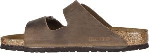 Arizona Narrow Unisex Shoes <div class="a-expander-content a-expander-partial-collapse-content" data-expanded="false"> <h3 class="product-facts-title">Product details</h3> <div class="a-fixed-left-grid product-facts-detail"> <div class="a-fixed-left-grid-inner" style="padding-left: 140px;"> <div class="a-fixed-left-grid-col a-col-left" style="width: 140px; margin-left: -140px; float: left;"><span style="font-weight: 600;"> <span class="a-color-base">Fabric type</span> </span></div> <div class="a-fixed-left-grid-col a-col-right" style="padding-left: 6%; float: left;"><span style="font-weight: 400;"> <span class="a-color-base">Fabric-and-synthetic</span> </span></div> </div> </div> <div class="a-fixed-left-grid product-facts-detail"> <div class="a-fixed-left-grid-inner" style="padding-left: 140px;"> <div class="a-fixed-left-grid-col a-col-left" style="width: 140px; margin-left: -140px; float: left;"><span style="font-weight: 600;"> <span class="a-color-base">Care instructions</span> </span></div> <div class="a-fixed-left-grid-col a-col-right" style="padding-left: 6%; float: left;"><span style="font-weight: 400;"> <span class="a-color-base">Hand Wash Only</span> </span></div> </div> </div> <div class="a-fixed-left-grid product-facts-detail"> <div class="a-fixed-left-grid-inner" style="padding-left: 140px;"> <div class="a-fixed-left-grid-col a-col-left" style="width: 140px; margin-left: -140px; float: left;"><span style="font-weight: 600;"> <span class="a-color-base">Origin</span> </span></div> <div class="a-fixed-left-grid-col a-col-right" style="padding-left: 6%; float: left;"><span style="font-weight: 400;"> <span class="a-color-base">Made in Germany</span> </span></div> </div> </div> <div class="a-fixed-left-grid product-facts-detail"> <div class="a-fixed-left-grid-inner" style="padding-left: 140px;"> <div class="a-fixed-left-grid-col a-col-left" style="width: 140px; margin-left: -140px; float: left;"><span style="font-weight: 600;"> <span class="a-color-base">Sole material</span> </span></div> <div class="a-fixed-left-grid-col a-col-right" style="padding-left: 6%; float: left;"><span style="font-weight: 400;"> <span class="a-color-base">Synthetic</span> </span></div> </div> </div> <hr class="a-spacing-base a-spacing-top-base a-divider-normal" aria-hidden="true" /> <h3 class="product-facts-title">About this item</h3> <ul class="a-unordered-list a-vertical a-spacing-small"> <li><span class="a-list-item a-size-base a-color-base">Narrow Width (, S, XN, Schmal, Estrecho, Slim, étroit, stretta)</span></li> </ul> <ul class="a-unordered-list a-vertical a-spacing-small"> <li><span class="a-list-item a-size-base a-color-base">Manufacturer: Birkenstock Material: Birko Flor</span></li> </ul> <ul class="a-unordered-list a-vertical a-spacing-small"> <li><span class="a-list-item a-size-base a-color-base">Footbed: EVA Sole: EVA</span></li> </ul> <ul class="a-unordered-list a-vertical a-spacing-small"> <li><span class="a-list-item a-size-base a-color-base">Made in Germany and send directly from Germany</span></li> </ul> <ul class="a-unordered-list a-vertical a-spacing-small"> <li><span class="a-list-item a-size-base a-color-base">Sandals</span></li> </ul> </div>