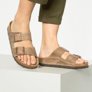 Men's Amalfi Leather Soft Footbed Arizona Sandals <div data-expanded="false" class="a-expander-content a-expander-partial-collapse-content"> <h3 class="product-facts-title"> Product details </h3> <div class="a-fixed-left-grid product-facts-detail"><div class="a-fixed-left-grid-inner" style="padding-left:140px"> <div class="a-fixed-left-grid-col a-col-left" style="width:140px;margin-left:-140px;float:left"> <span style="font-weight: 600"> <span class="a-color-base">Origin</span> </span> </div> <div class="a-fixed-left-grid-col a-col-right" style="padding-left:6%;float:left"> <span style="font-weight: 400"> <span class="a-color-base">Not Imported</span> </span> </div> </div></div> <div class="a-fixed-left-grid product-facts-detail"><div class="a-fixed-left-grid-inner" style="padding-left:140px"> <div class="a-fixed-left-grid-col a-col-left" style="width:140px;margin-left:-140px;float:left"> <span style="font-weight: 600"> <span class="a-color-base">Sole material</span> </span> </div> <div class="a-fixed-left-grid-col a-col-right" style="padding-left:6%;float:left"> <span style="font-weight: 400"> <span class="a-color-base">Foam, Cork, Suede, Rubber</span> </span> </div> </div></div> <div class="a-fixed-left-grid product-facts-detail"><div class="a-fixed-left-grid-inner" style="padding-left:140px"> <div class="a-fixed-left-grid-col a-col-left" style="width:140px;margin-left:-140px;float:left"> <span style="font-weight: 600"> <span class="a-color-base">Outer material</span> </span> </div> <div class="a-fixed-left-grid-col a-col-right" style="padding-left:6%;float:left"> <span style="font-weight: 400"> <span class="a-color-base">Suede</span> </span> </div> </div></div> <div class="a-fixed-left-grid product-facts-detail"><div class="a-fixed-left-grid-inner" style="padding-left:140px"> <div class="a-fixed-left-grid-col a-col-left" style="width:140px;margin-left:-140px;float:left"> <span style="font-weight: 600"> <span class="a-color-base">Closure type</span> </span> </div> <div class="a-fixed-left-grid-col a-col-right" style="padding-left:6%;float:left"> <span style="font-weight: 400"> <span class="a-color-base">Buckle</span> </span> </div> </div></div> <hr aria-hidden="true" class="a-spacing-base a-spacing-top-base a-divider-normal"> <h3 class="product-facts-title"> About this item </h3> <ul class="a-unordered-list a-vertical a-spacing-small"> <li><span class="a-list-item a-size-base a-color-base">Rubber sole</span></li> </ul> <ul class="a-unordered-list a-vertical a-spacing-small"> <li><span class="a-list-item a-size-base a-color-base">roomy toe box; lined with sued</span></li> </ul> <ul class="a-unordered-list a-vertical a-spacing-small"> <li><span class="a-list-item a-size-base a-color-base">features pronounced arch support with an extra layer of super soft foam cushioning</span></li> </ul> <ul class="a-unordered-list a-vertical a-spacing-small"> <li><span class="a-list-item a-size-base a-color-base">Contoured cork footbed conforms to the shape of your foot</span></li> </ul> </div>