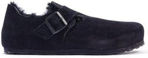 Birkenstock Unisex London Shearling Suede Shoes Shearling Black <div id="productFactsDesktop_feature_div" class="celwidget" data-feature-name="productFactsDesktop" data-csa-c-type="widget" data-csa-c-content-id="productFactsDesktop" data-csa-c-slot-id="productFactsDesktop_feature_div" data-csa-c-asin="" data-csa-c-is-in-initial-active-row="false" data-csa-c-id="l05et7-pkzkve-6w42la-lj3dv0" data-cel-widget="productFactsDesktop_feature_div"> <div id="productFactsDesktopExpander" class="a-expander-collapsed-height a-row a-expander-container a-spacing-medium a-expander-partial-collapse-container" data-a-expander-name="productFactsDesktopExpander" data-a-expander-collapsed-height="400"> <div class="a-expander-content a-expander-partial-collapse-content" data-expanded="false"> <ul class="a-unordered-list a-vertical a-spacing-small"> <li><span class="a-list-item a-size-base a-color-base">High-quality suede leather upper.</span></li> </ul> <ul class="a-unordered-list a-vertical a-spacing-small"> <li><span class="a-list-item a-size-base a-color-base">Soft and warm shearling lining for comfort.</span></li> </ul> <ul class="a-unordered-list a-vertical a-spacing-small"> <li><span class="a-list-item a-size-base a-color-base">Non-removable shearling lined footbed for cushioning and warmth.</span></li> </ul> <ul class="a-unordered-list a-vertical a-spacing-small"> <li><span class="a-list-item a-size-base a-color-base">Adjustable buckle closure for secure fit.</span></li> </ul> <ul class="a-unordered-list a-vertical a-spacing-small"> <li><span class="a-list-item a-size-base a-color-base">Flexible, lightweight and shock-absorbing EVA sole.</span></li> </ul> </div> </div> </div> <div id="provenanceCertifications_feature_div" class="celwidget" data-feature-name="provenanceCertifications" data-csa-c-type="widget" data-csa-c-content-id="provenanceCertifications" data-csa-c-slot-id="provenanceCertifications_feature_div" data-csa-c-asin="" data-csa-c-is-in-initial-active-row="false" data-csa-c-id="bjkxdn-u1iju7-qf5gi3-iinrxa" data-cel-widget="provenanceCertifications_feature_div"></div> <div id="handmadeArtisanCard_feature_div" class="celwidget" data-feature-name="handmadeArtisanCard" data-csa-c-type="widget" data-csa-c-content-id="handmadeArtisanCard" data-csa-c-slot-id="handmadeArtisanCard_feature_div" data-csa-c-asin="" data-csa-c-is-in-initial-active-row="false" data-csa-c-id="iho340-30gk5z-azzu8v-xe7gif" data-cel-widget="handmadeArtisanCard_feature_div"></div> <div id="globalStoreInfoBullets_feature_div" class="celwidget" data-feature-name="globalStoreInfoBullets" data-csa-c-type="widget" data-csa-c-content-id="globalStoreInfoBullets" data-csa-c-slot-id="globalStoreInfoBullets_feature_div" data-csa-c-asin="" data-csa-c-is-in-initial-active-row="false" data-csa-c-id="ll7eu5-qflw45-2rs2q3-j7e6zc" data-cel-widget="globalStoreInfoBullets_feature_div"></div> <div id="olp_feature_div" class="celwidget" data-feature-name="olp" data-csa-c-type="widget" data-csa-c-content-id="olp" data-csa-c-slot-id="olp_feature_div" data-csa-c-asin="" data-csa-c-is-in-initial-active-row="false" data-csa-c-id="66btz-ghx2pp-gd905d-mn04o1" data-cel-widget="olp_feature_div"></div> <div id="buyingOptionNostosBadge_feature_div" class="celwidget" data-feature-name="buyingOptionNostosBadge" data-csa-c-type="widget" data-csa-c-content-id="buyingOptionNostosBadge" data-csa-c-slot-id="buyingOptionNostosBadge_feature_div" data-csa-c-asin="" data-csa-c-is-in-initial-active-row="false" data-csa-c-id="ufggx5-42e9g2-5tbr3j-z28jwn" data-cel-widget="buyingOptionNostosBadge_feature_div"></div> <div id="tellAmazon_feature_div" class="celwidget" data-feature-name="tellAmazon" data-csa-c-type="widget" data-csa-c-content-id="tellAmazon" data-csa-c-slot-id="tellAmazon_feature_div" data-csa-c-asin="" data-csa-c-is-in-initial-active-row="false" data-csa-c-id="t07zlv-omordp-59xnsp-n9raa7" data-cel-widget="tellAmazon_feature_div"></div> <div id="valuePick_feature_div" class="celwidget" data-feature-name="valuePick" data-csa-c-type="widget" data-csa-c-content-id="valuePick" data-csa-c-slot-id="valuePick_feature_div" data-csa-c-asin="" data-csa-c-is-in-initial-active-row="false" data-csa-c-id="clr2zh-ofynck-dy530u-mdp763" data-cel-widget="valuePick_feature_div"></div> <div id="heroQuickPromo_feature_div" class="celwidget" data-feature-name="heroQuickPromo" data-csa-c-type="widget" data-csa-c-content-id="heroQuickPromo" data-csa-c-slot-id="heroQuickPromo_feature_div" data-csa-c-asin="" data-csa-c-is-in-initial-active-row="false" data-csa-c-id="m93wrf-o177vx-ihtx8n-qvquc7" data-cel-widget="heroQuickPromo_feature_div"> <div id="hero-quick-promo-grid_feature_div"> <div id="hero-quick-promo" class="a-row a-spacing-medium"></div> </div> </div>